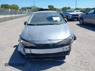 2025 Toyota Corolla LE z VIN 5YFB4MDEXSP240479, wystawiony jako IAAI lot #41769331 z przebiegiem 1075 mil mil oraz . Historia ofert i sprzedaży dostępna na DreamBid. Obrazek 6.