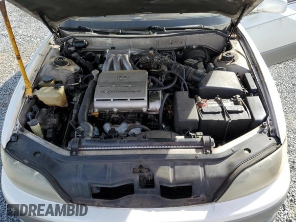 1995 Lexus ES 300 with VIN JT8GK13T8S0107061, listed as a Copart auction lot 49986875 with 306,343 mi miles and Salvage Title. Bid and sale history available at DreamBid. Image 12.