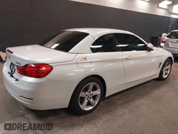 2015 BMW 4 Series 428i xDrive with VIN WBA3T1C52FP821020, listed as a IAAI auction lot 42004707 with 74,951 mi miles and . Bid and sale history available at carsss.com. Image 4.