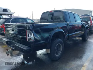 2002 Dodge Dakota Sport with VIN 1B7HG38N32S641652, listed as a IAAI auction lot 41621233 with 250,148 mi miles. Bid and sale history available at carsss.com. Image 4.