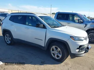 2023 Jeep Compass Latitude with VIN 3C4NJDBN9PT506040, listed as a IAAI auction lot 41483552 with 24,009 mi miles and . Bid and sale history available at DreamBid. Image 1.