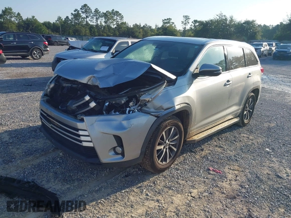 2018 Toyota Highlander SE with VIN 5TDKZRFH7JS531369, listed as a IAAI auction lot 42671645 with 130,222 mi miles and . Bid and sale history available at DreamBid. Image 2.