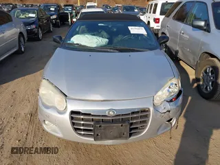 2004 Chrysler Sebring LXi with VIN 1C3EL55R54N239266, listed as a IAAI auction lot 41792875 with 76,712 mi miles and . Bid and sale history available at DreamBid. Image 12.