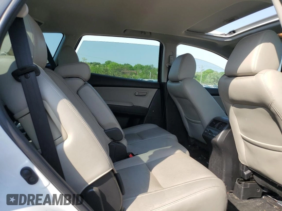 2015 Mazda CX-9 Touring z VIN JM3TB2CA7F0467259, wystawiony jako Copart lot #55646055 z przebiegiem Nie podano mil oraz Czysty tytuł • Clean title. Historia ofert i sprzedaży dostępna na DreamBid. Obrazek 11.