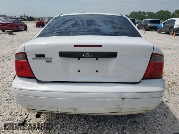 2007 Ford Focus S with VIN 1FAHP34NX7W225626, listed as a Copart auction lot 58202395 with 157,844 mi miles and Salvage title. Bid and sale history available at DreamBid. Image 6.