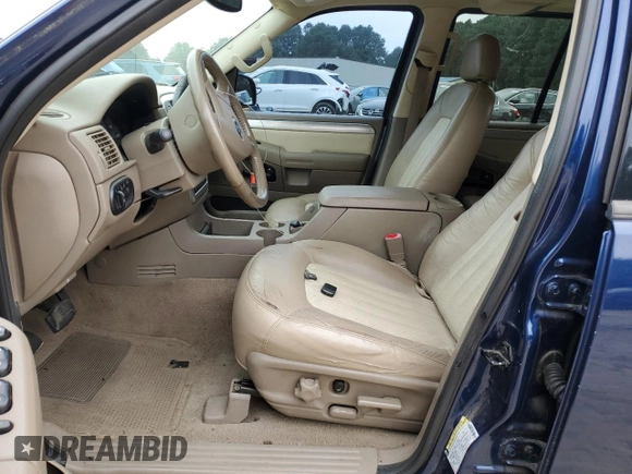 2004 Mercury Mountaineer Convenience z VIN 4M2ZU86K44ZJ49011, wystawiony jako Copart lot #69615444 z przebiegiem 135 702 mil mil oraz Szkoda całkowita • Salvage title. Historia ofert i sprzedaży dostępna na DreamBid. Obrazek 7.
