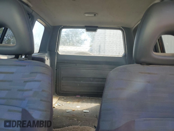 1996 Toyota RAV4 with VIN JT3GP10V3T0005875, listed as a Copart auction lot 57359135 with 240,763 mi miles and Salvage Title. Bid and sale history available at DreamBid. Image 10.