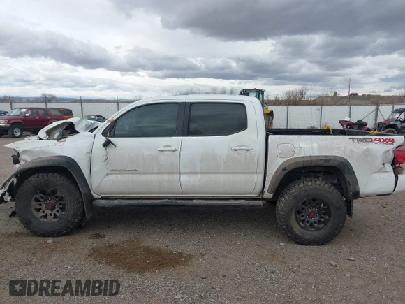 2017 Toyota Tacoma SR5 z VIN 3TMCZ5AN8HM077203, wystawiony jako IAAI lot #41765910 z przebiegiem 170 863 mil mil oraz . Historia ofert i sprzedaży dostępna na DreamBid. Obrazek 14.