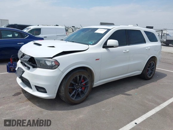 2018 Dodge Durango SRT with VIN 1C4SDJGJ2JC434843, listed as a IAAI auction lot 42434327 with 144,483 mi miles and . Bid and sale history available at DreamBid. Image 2.