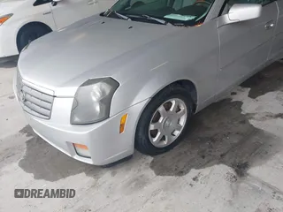 2003 Cadillac CTS z VIN 1G6DM57N930145288, wystawiony jako IAAI lot #42256164 z przebiegiem 184 428 mil mil oraz . Historia ofert i sprzedaży dostępna na DreamBid. Obrazek 6.