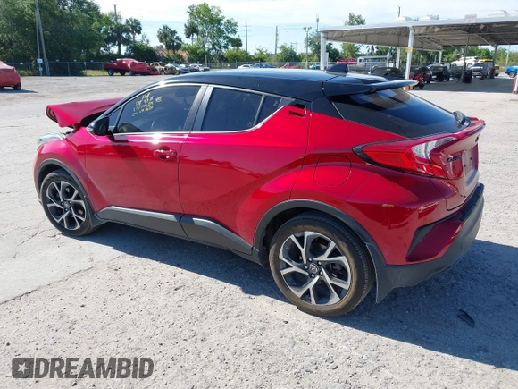 2020 Toyota C-HR LE with VIN JTNKHMBX3L1066720, listed as a IAAI auction lot 42042139 with 98,925 mi miles and . Bid and sale history available at DreamBid. Image 3.