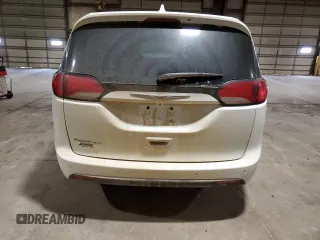 2020 Chrysler Pacifica Touring with VIN 2C4RC1FG7LR267106, listed as a Copart auction lot 58535025 with 137,330 mi miles and Salvage title. Bid and sale history available at DreamBid. Image 6.
