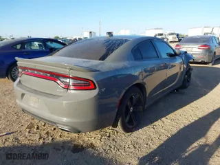 2018 Dodge Charger SXT Plus with VIN 2C3CDXHGXJH114343, listed as a IAAI auction lot 41758045 with 118,808 mi miles. Bid and sale history available at carsss.com. Image 4.