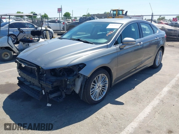 2014 Ford Fusion SE Hybrid with VIN 3FA6P0LU5ER393530, listed as a IAAI auction lot 42478440 with 93,728 mi miles and . Bid and sale history available at DreamBid. Image 2.