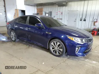 2018 Kia Optima LX z VIN 5XXGT4L33JG250352, wystawiony jako Copart lot #56005915 z przebiegiem 68 430 mil mil oraz Czysty tytuł • Clean title. Historia ofert i sprzedaży dostępna na DreamBid. Obrazek 4.