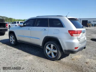 2012 Jeep Grand Cherokee Overland with VIN 1C4RJFCG5CC272580, listed as a Copart auction lot 50075735 with 209,368 mi miles and Salvage Title. Bid and sale history available at carsss.com. Image 2.