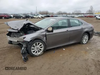 2023 Toyota Camry LE z VIN 4T1C11AK8PU112043, wystawiony jako Copart lot #52410635 z przebiegiem Nie podano mil oraz Nie do naprawy • Non repairable. Historia ofert i sprzedaży dostępna na DreamBid. Obrazek 1.