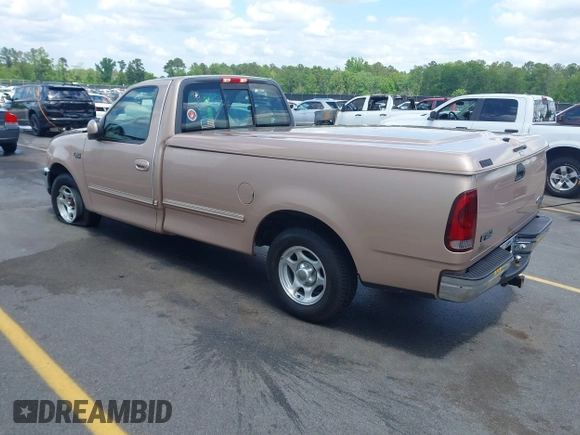 1997 Ford F-150 with VIN 1FTDF17W9VNA84250, listed as a IAAI auction lot 42149320 with 85,297 mi miles and . Bid and sale history available at DreamBid. Image 3.