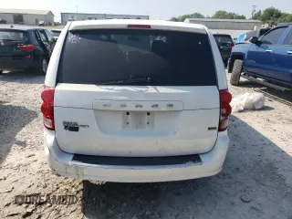 2016 Dodge Grand Caravan SE with VIN 2C4RDGBG3GR209697, listed as a Copart auction lot 54839565 with 204,947 mi miles and Salvage Title. Bid and sale history available at DreamBid. Image 6.