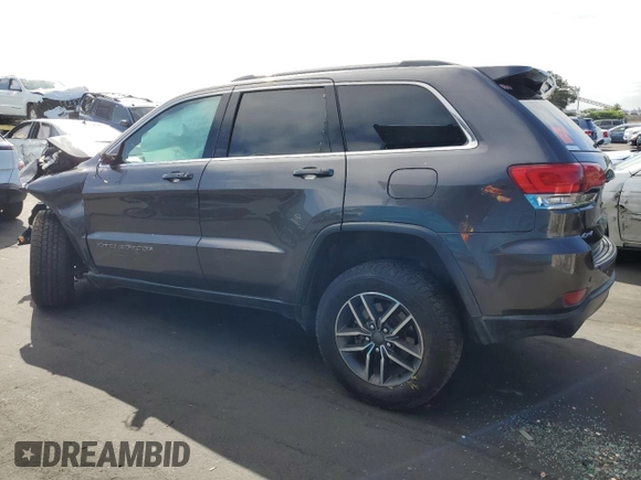 2019 Jeep Grand Cherokee Altitude with VIN 1C4RJFAG5KC591141, listed as a Copart auction lot 56885105 with 88,000 mi miles and Salvage title. Bid and sale history available at DreamBid. Image 2.