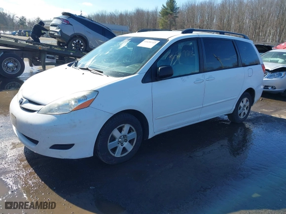 2010 Toyota Sienna CE with VIN 5TDKK4CC0AS329537, listed as a IAAI auction lot 41659723 with 258,226 mi miles. Bid and sale history available at carsss.com. Image 2.