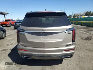 2023 Cadillac XT6 AWD Sport z VIN 1GYKPHRSXPZ181132, wystawiony jako Copart lot #50512825 z przebiegiem 17 302 mil mil oraz Szkody całkowita. Historia ofert i sprzedaży dostępna na DreamBid. Obrazek 6.