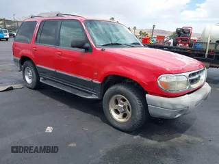 1999 Ford Explorer XLT z VIN 1FMZU35P5XZB62128, wystawiony jako IAAI lot #42635627 z przebiegiem 221 556 mil mil oraz . Historia ofert i sprzedaży dostępna na DreamBid. Obrazek 1.