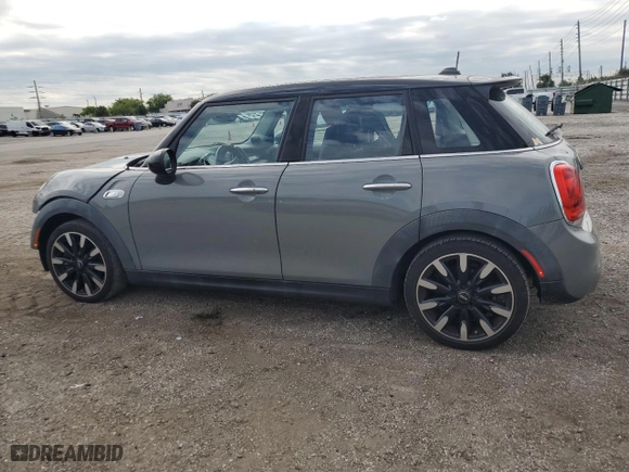 2015 MINI Cooper Hardtop 4 Door S with VIN WMWXU3C59F2B59298, listed as a Copart auction lot 76476034 with 76,363 mi miles and Salvage Title. Bid and sale history available at carsss.com. Image 2.