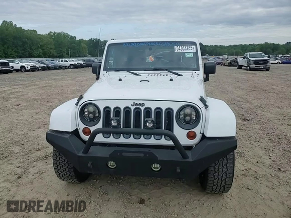 2012 Jeep Wrangler Unlimited Sahara with VIN 1C4HJWEG8CL126053, listed as a Copart auction lot 54363285 with 88,014 mi miles and Salvage title. Bid and sale history available at DreamBid. Image 13.