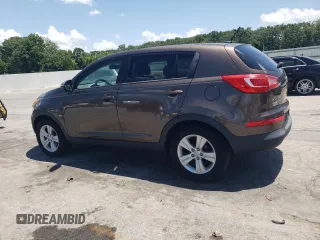 2012 Kia Sportage LX with VIN KNDPB3A20C7276250, listed as a Copart auction lot 61804995 with 112,303 mi miles and Salvage title. Bid and sale history available at DreamBid. Image 2.