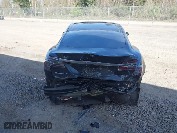 2014 Tesla Model S 60 z VIN 5YJSA1H19EFP45024, wystawiony jako IAAI lot #41960222 z przebiegiem 108 573 mil mil oraz . Historia ofert i sprzedaży dostępna na DreamBid. Obrazek 17.