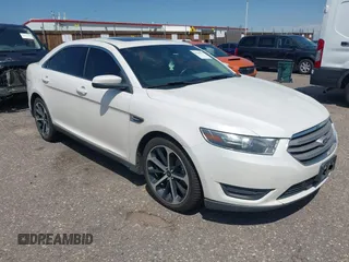 2015 Ford Taurus SEL with VIN 1FAHP2H8XFG203309, listed as a IAAI auction lot 42598215 with 163,190 mi miles and . Bid and sale history available at DreamBid. Image 1.