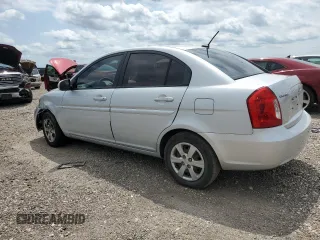 2010 Hyundai Accent GLS z VIN KMHCN4ACXAU473196, wystawiony jako Copart lot #55462405 z przebiegiem 198 235 mil mil oraz Szkoda całkowita • Salvage title. Historia ofert i sprzedaży dostępna na DreamBid. Obrazek 2.