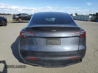 2023 Tesla Model Y Long Range with VIN 7SAYGDEE9PF638742, listed as a Copart auction lot 48188455 with 30,550 mi miles and Salvage Title. Bid and sale history available at DreamBid. Image 6.