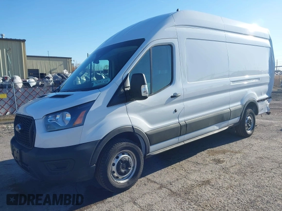 2024 Ford Transit Cargo z VIN 1FTBW3X89RKB49268, wystawiony jako IAAI lot #42081360 z przebiegiem 7 290 mil mil oraz . Historia ofert i sprzedaży dostępna na DreamBid. Obrazek 2.