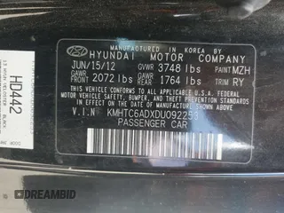 2013 Hyundai Veloster w/Gray Int z VIN KMHTC6ADXDU092253, wystawiony jako Copart lot #57708055 z przebiegiem 141 904 mil mil oraz Tytuł czysty. Historia ofert i sprzedaży dostępna na DreamBid. Obrazek 12.