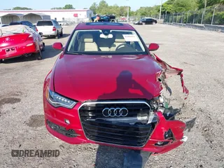 2014 Audi A6 Prestige with VIN WAUHGAFC6EN060054, listed as a IAAI auction lot 42006061 with 42,381 mi miles and . Bid and sale history available at DreamBid. Image 13.