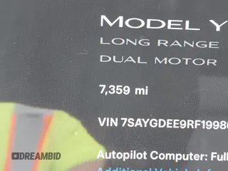 2024 Tesla Model Y Long Range with VIN 7SAYGDEE9RF199805, listed as a IAAI auction lot 42018221 with 7,359 mi miles. Bid and sale history available at carsss.com. Image 16.