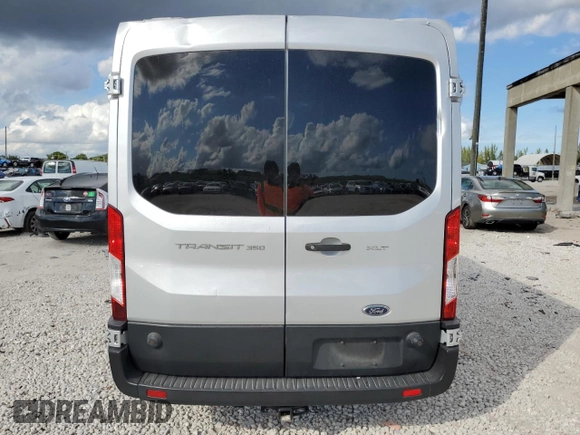 2019 Ford Transit Passenger XL with VIN 1FBAX2CM1KKA66367, listed as a Copart auction lot 79059804 with 80,577 mi miles and Salvage Title. Bid and sale history available at carsss.com. Image 6.