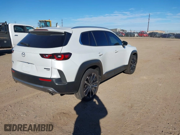 2024 Mazda CX-50 Premium z VIN 7MMVABDY0RN186511, wystawiony jako IAAI lot #41229255 z przebiegiem 21 842 mil mil oraz . Historia ofert i sprzedaży dostępna na DreamBid. Obrazek 4.