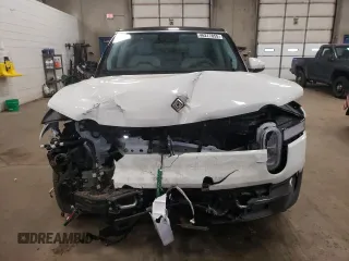 2023 Rivian R1S Adventure with VIN 7PDSGABA8PN014637, listed as a Copart auction lot 46277855 with 20,343 mi miles and Salvage Title. Bid and sale history available at DreamBid. Image 5.