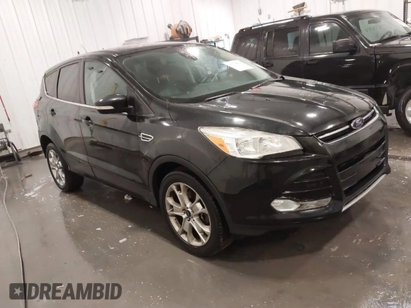 2013 Ford Escape SEL with VIN 1FMCU9H99DUD11347, listed as a IAAI auction lot 41758824 with 154,339 mi miles. Bid and sale history available at carsss.com. Image 1.
