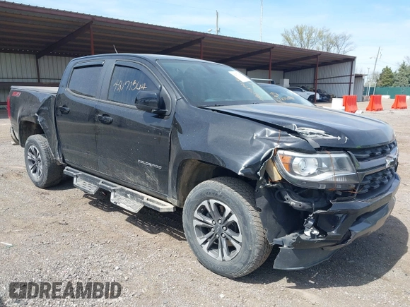 2021 Chevrolet Colorado 4WD Z71 z VIN 1GCGTDEN1M1256939, wystawiony jako IAAI lot #42071364 z przebiegiem 38 972 mil mil oraz . Historia ofert i sprzedaży dostępna na DreamBid. Obrazek 1.