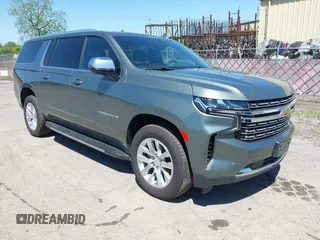 2023 Chevrolet Suburban Premier z VIN 1GNSKFKD5PR306646, wystawiony jako IAAI lot #42290668 z przebiegiem 78 099 mil mil oraz . Historia ofert i sprzedaży dostępna na DreamBid. Obrazek 1.