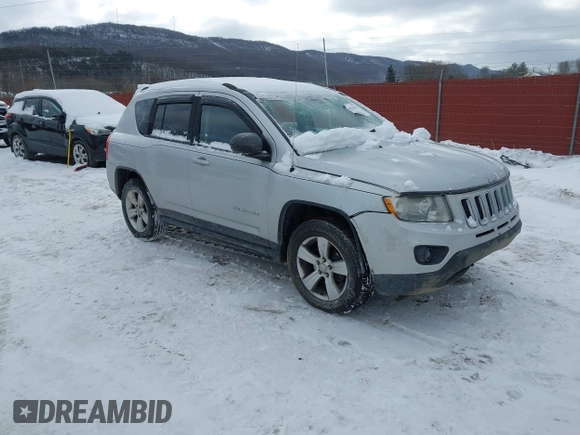 2013 Jeep Compass Sport with VIN 1C4NJDBB1DD113866, listed as a IAAI auction lot 41246375 with 204,405 mi miles. Bid and sale history available at carsss.com. Image 1.