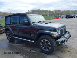 2019 Jeep Wrangler Unlimited Sahara with VIN 1C4HJXEN3KW622167, listed as a IAAI auction lot 41880702 with 72,928 mi miles and . Bid and sale history available at DreamBid. Image 14.