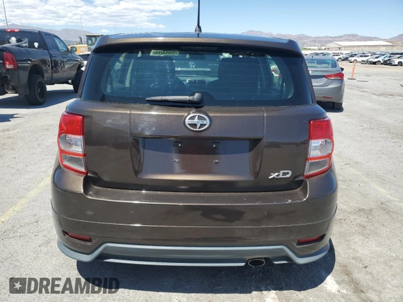 2011 Scion xD z VIN JTKKU4B44B1010587, wystawiony jako Copart lot #55654225 z przebiegiem 87 926 mil mil oraz Szkody całkowita. Historia ofert i sprzedaży dostępna na DreamBid. Obrazek 6.