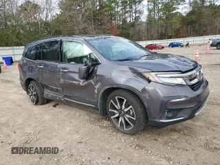 2020 Honda Pilot Touring 8-Passenger with VIN 5FNYF5H91LB004386, listed as a Copart auction lot 85913984 with 54,692 mi miles and Salvage Title. Bid and sale history available at DreamBid. Image 4.