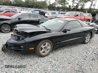 2002 Pontiac Firebird Formula z VIN 2G2FV22G822114416, wystawiony jako Copart lot #80131354 z przebiegiem 130 097 mil mil oraz Szkody całkowita. Historia ofert i sprzedaży dostępna na DreamBid. Obrazek 1.