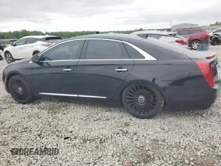2017 Cadillac XTS Luxury z VIN 2G61M5S34H9199779, wystawiony jako Copart lot #54131845 z przebiegiem 110 571 mil mil oraz Szkoda całkowita • Salvage title. Historia ofert i sprzedaży dostępna na DreamBid. Obrazek 2.